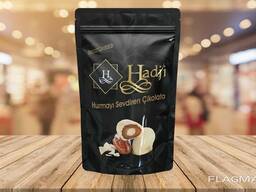 "Hadji" chocolate dates with almonds