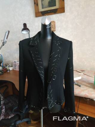 Drabužių ir kitų tekstilės gaminių taisymo ir siuvimo meistras.